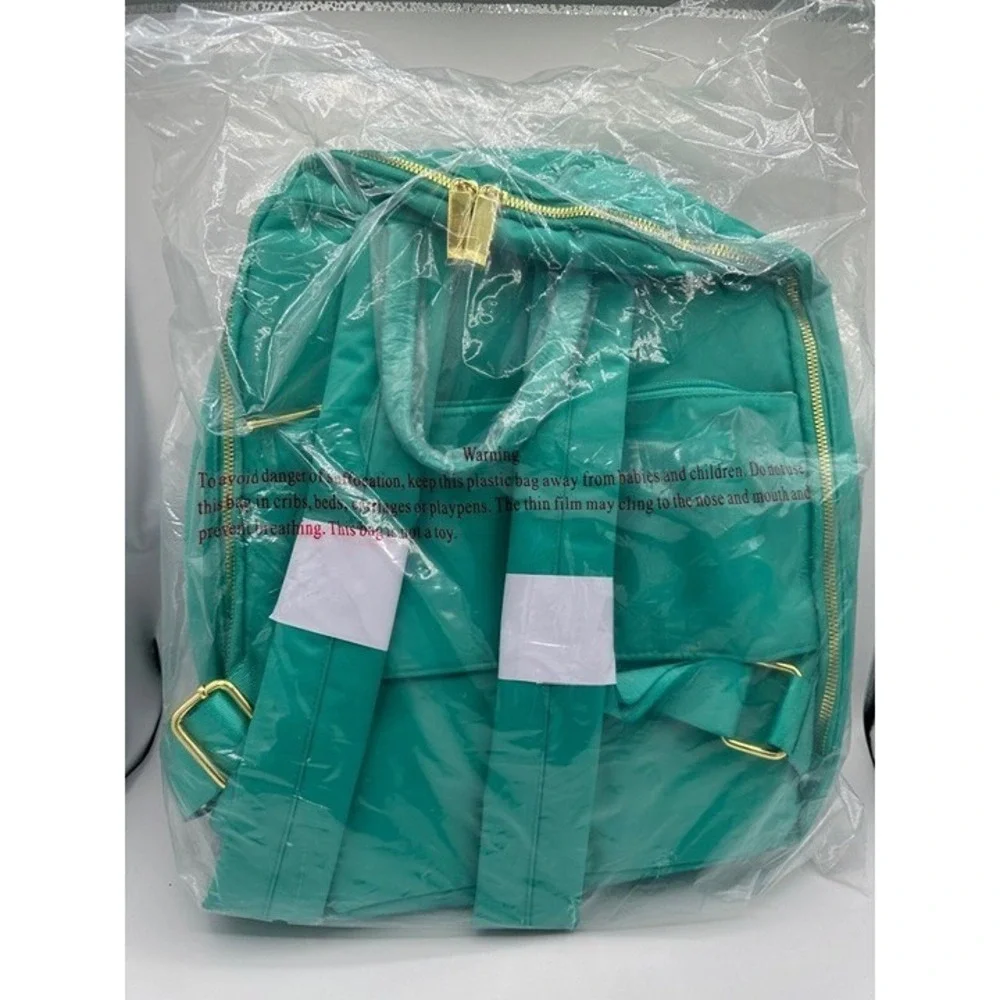Joy‎ Mangano Quilted Backpack- - Antimicrobial and RFID Blocking